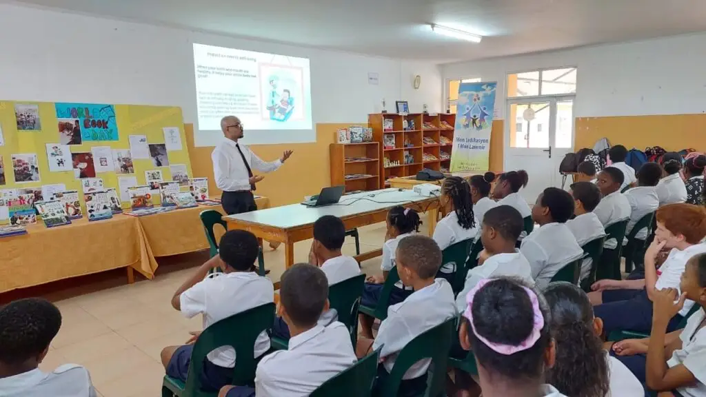 Dr. Bibhakar Ranjan giving oral health awareness talk to school students in Seychelles